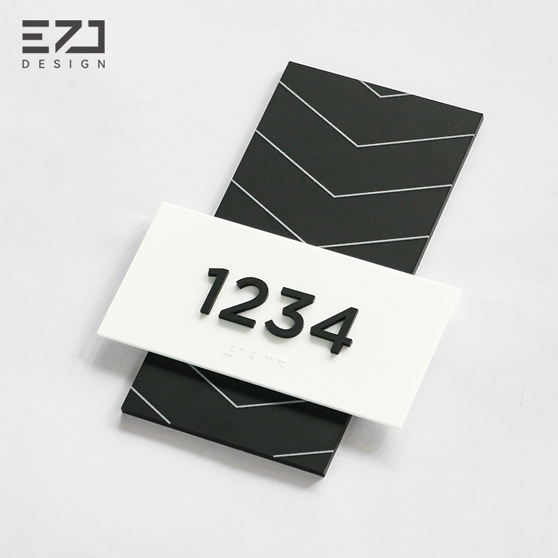 Modern geometric acrylic hotel room number sign with dark gray layered design and Braille