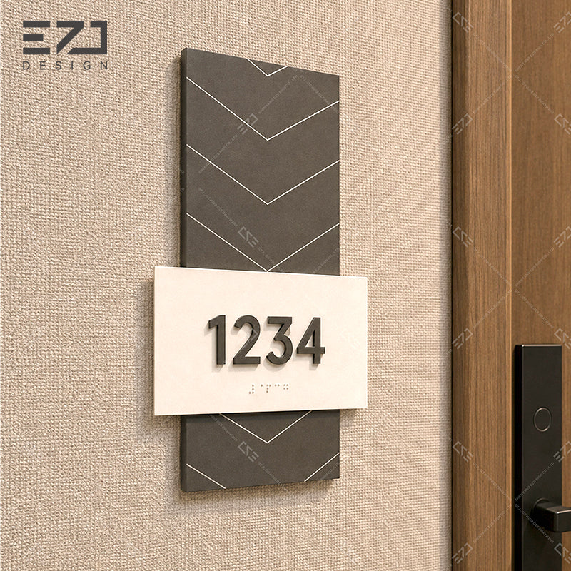 Application reference for a modern geometric hotel room number sign beside a door