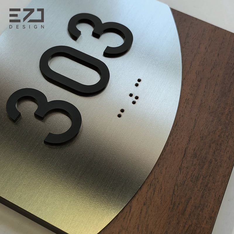 Raised room number and brushed stainless steel detail